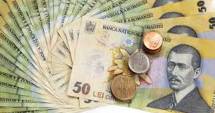 Stire din Economie : Leul pierde la dolar, dar recuperează la euro