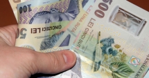 Stire din Economie : Leul pierde la euro și francul elvețian