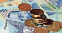 Stire din Economie : Leul a câștigat la euro și franc, dar a pierdut la dolar