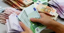Stire din Economie : Leul pierde la euro și francul elvețian, dar câștigă la dolar