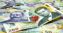 Stire din Economie : Leul pierde la euro și dolar, dar câștigă la francul elvețian