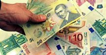 Stire din Economie : Leul câștigă la euro și francul elvețian, dar pierde la dolar