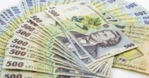 Stire din Economie : Leul câștigă la euro și dolar, dar pierde la francul elvețian