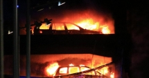 Stire din Eveniment : INCENDIU într-o parcare supraetajată: 1.600 de mașini au ars