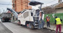 Stire din Eveniment : Lucrările de modernizare a carosabilului în cartierul Faleză Nord continuă