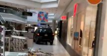 Stire din Actualitate : Un tânăr a intrat cu mașina într-un mall și A DISTRUS tot ce-i statea în cale!
