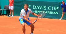 Stire din Sport : Galerie foto. Copil aduce primul punct! Sâmbătă, pumnii strânși pentru Tecău și Mergea