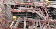 Stire din Eveniment : Doi români au căzut de la 15 metri pe un şantier, după ce schela pe care se aflau s-a prăbuşit sub ei
