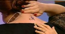 Stire din Monden : Oana Roman, tatuaj pentru soț și fiică! Iată ce și-a scris pe ceafă