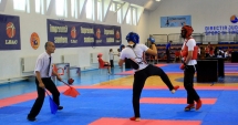 Stire din Sport : O nouă probă sportivă în programul de Kung Fu - lupte libere chineze