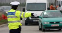 Stire din Eveniment : Un polițist a fost lovit și târât de o mașină care a trecut pe roșu