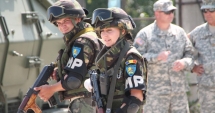 Stire din Eveniment : Primul detașament de poliție militară comandat de  o femeie se întoarce din Afganistan