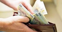 Stire din Social : Salariul minim rămâne 1.250 de lei. Majorarea, decisă de noul guvern, la anul