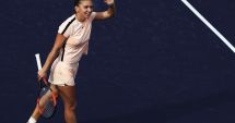 Stire din Sport : Simona Halep trece cu bine peste "tăvălugul" Caroline Dolehide