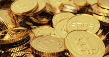 Stire din Economie : După o ascensiune rapidă, bitcoin se prăbușește