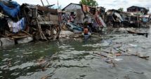 Sate şi terenuri agricole inundate în urma unui taifun care a lovit nordul Filipinelor