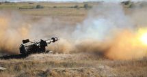 Stire din Eveniment : Trageri experimentale cu obuzierul de calibru 152 mm, în Poligonul Capu Midia