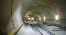Stire din Actualitate : Cel mai lung tunel de cale ferată din lume: 57 de km pe sub Alpi