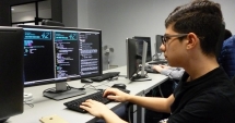Stire din Economie : UE vrea  să impoziteze cifra de afaceri a companiilor informatice