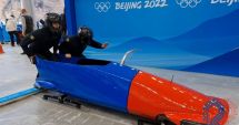 Stire din Sport : Olimpism / Curajoșii din bobul de 65.000 de euro! Românii care lucrează pentru alte naţiuni au strigat… „Hai, România”!