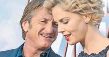 Stire din Monden : Madonna vrea să-l despartă pe Sean Penn de Charlize Theron