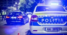 Stire din Eveniment : O mașină cu hoți, oprită pe roșu. Poliția a prins un urmărit internațional