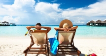 Stire din Social : Voucherele de vacanță, acordate începând  din primăvara lui 2018