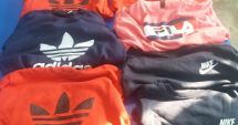 Parfumuri și haine contrafăcute, vândute la Constanța