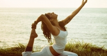 Beneficiile terapeutice ale practicii Yoga