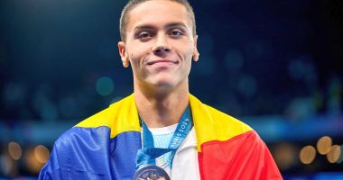 Stire din Sport : Campanie umanitară: David Popovici donează echipamentul de la JO 2024 pentru a strânge 115.000 de euro