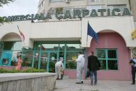 Stire din Eveniment : Cei doi afaceriști care se presupune că au jefuit Banca "Carpatica" rămân în arest