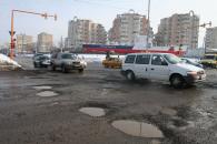Stire din Social : Scăpăm de zăpadă, dar rămânem cu gropile