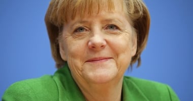 Donald Trump, avertizat dur de Angela Merkel