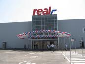 Real aniversează patru ani pe piața din România
