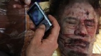Noi imagini terifiante cu cadavrul lui Gaddafi / IMAGINI ȘOCANTE - 5