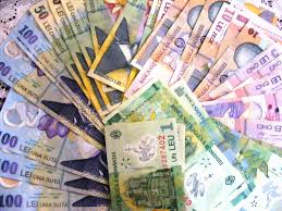 Stire din Economie : Leul pierde la euro și dolar, dar câștigă la francul elvețian