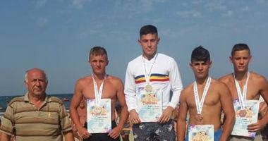 Stire din Sport : Luptătorii constănțeni, la înălțime!  Medalii la Naționale, pe plaja din Mamaia