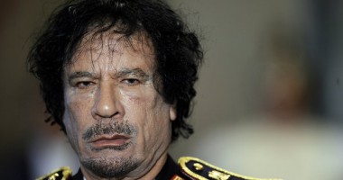 Muammar Gaddafi, urmărit de Interpol