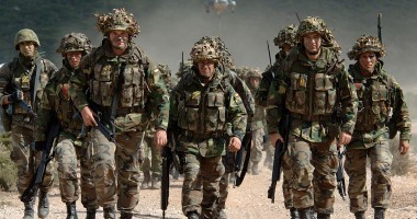 NATO a început procesul de predare a controlului în provinciile afgane