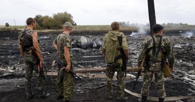 Stire din Actualitate : Alte fragmente umane, printre rămășițele epavei avionului malaezian