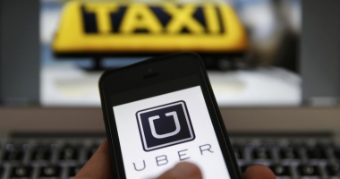 Uber cere să fie reglementat
