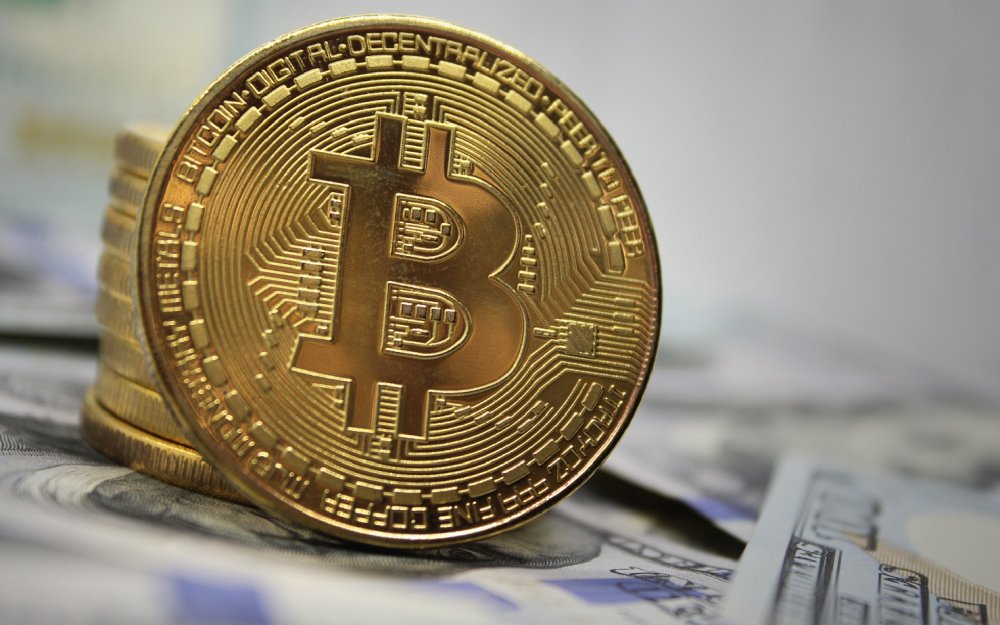 Bitcoin a depăşit pentru prima dată plafonul de 20.000 de dolari - 1-1608136582.jpg
