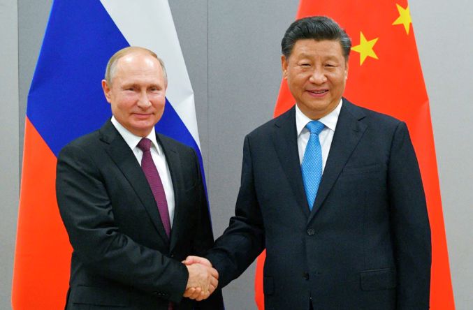 Vladimir Putin elogiază relaţiile ruso-chineze şi dorinţa Beijingului de a juca un rol constructiv în criza ucraineană - 1-1679296527.jpg