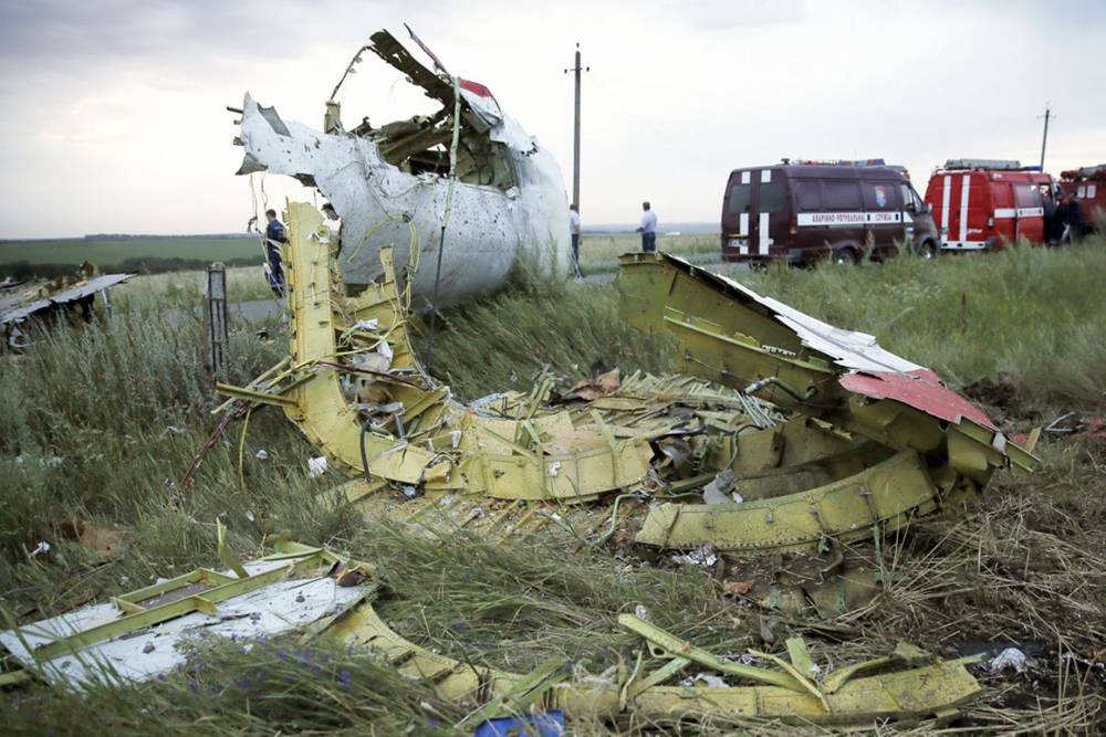 MH17: Noi rămășițe umane au fost descoperite la locul prăbușirii avionului, în UCRAINA - 120-1415777901.jpg