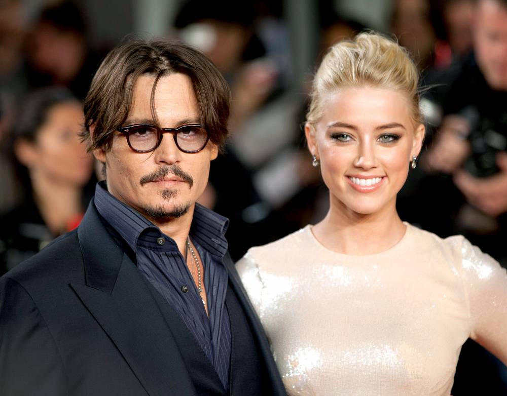 Johnny Depp și Amber Heard, la un pas de divorț? - 1389969512johnnydeppamberheardzo-1430821298.jpg