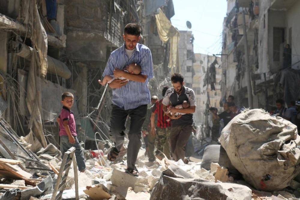 Mai multe avioane neidentificate au bombardat orașul sirian unde a avut loc presupusul atac chimic - alepposiria-1491646119.jpg