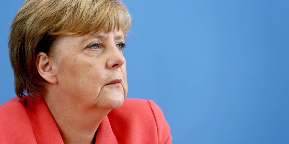 Angela Merkel îi îndeamnă pe cei cu origini turce să nu aducă în Germania conflictele din Turcia - angelamerkel-1472411476.jpg