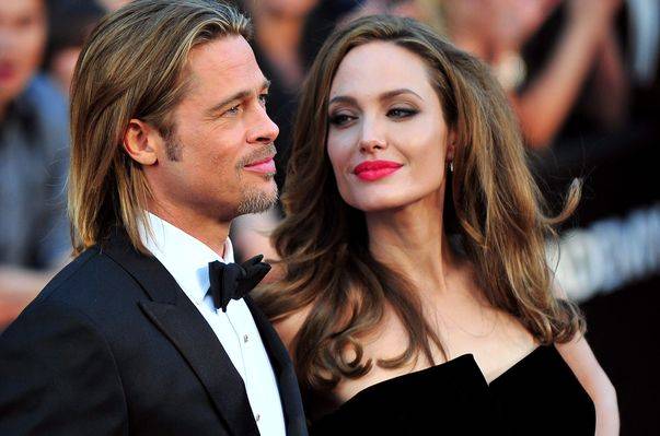 Angelina Jolie și Brad Pitt, din nou împreună pe marele ecran - angelinajoliebradpittcadouelicop-1399115436.jpg