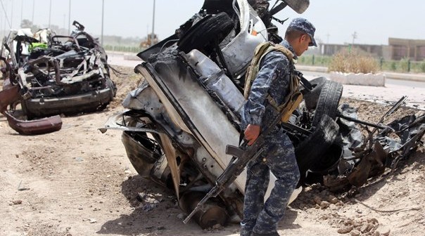 Cel puțin 13 morți într-un triplu atentat cu bombă la Bagdad - bagdad-1412148290.jpg