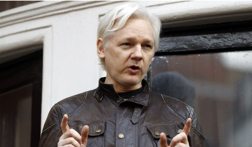 Julian Assange, condamnat la aproape un an de închisoare - julianassange-1556713877.jpg